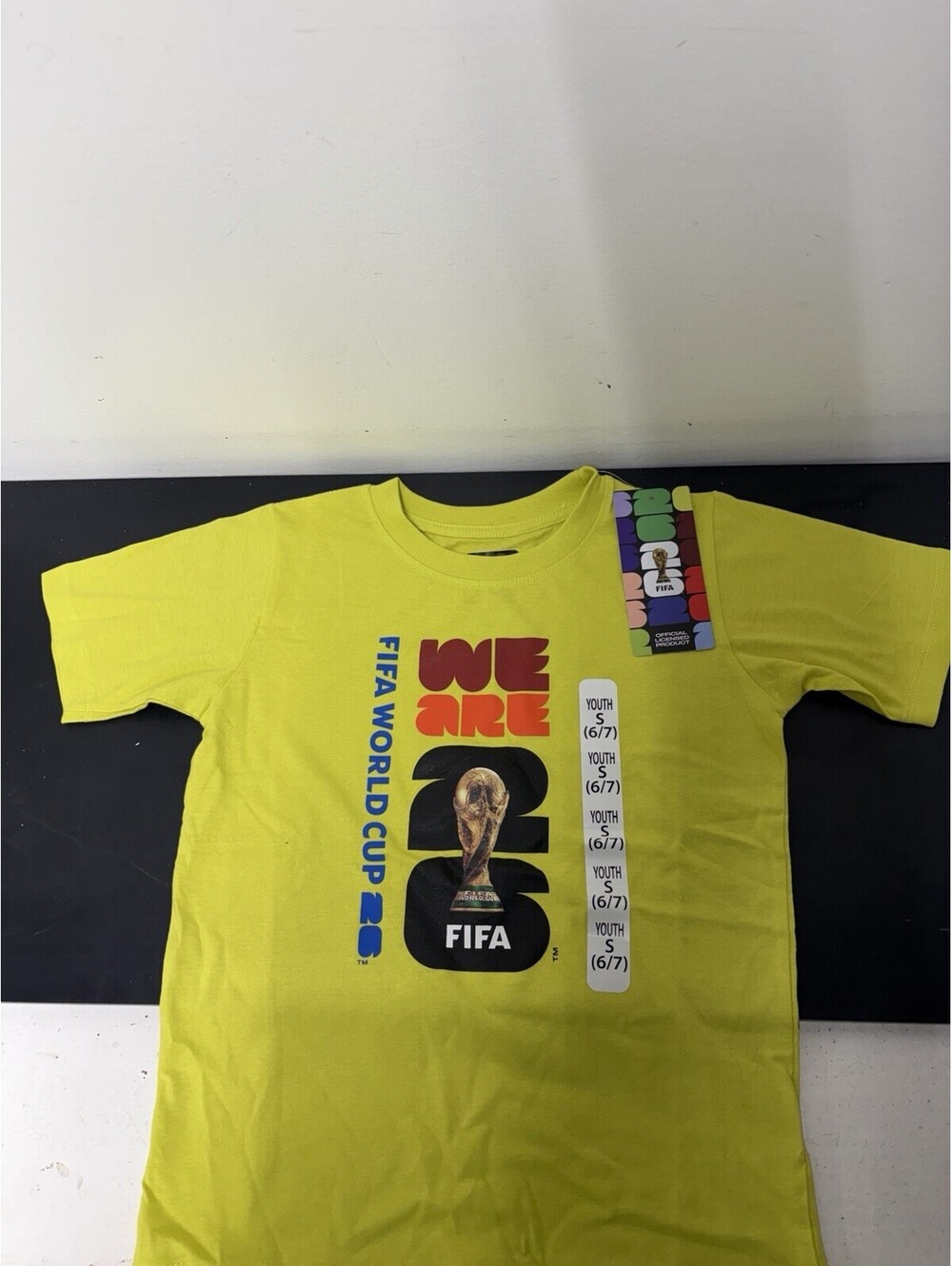 Official FIFA World Cup 2026 Yellow T-Shirt “We Are FIFA” Youth Size S (NEW)